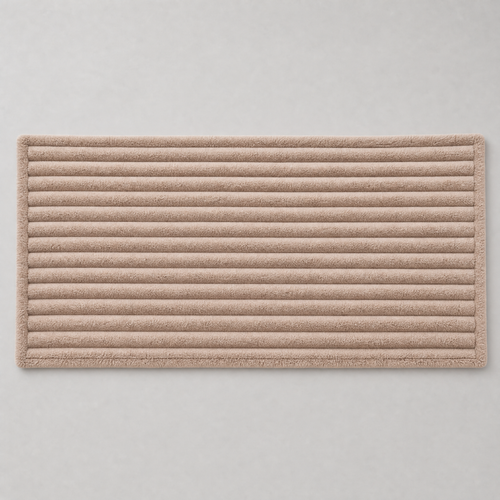Latte chunky ribbed couch cover laid flat, seen from above