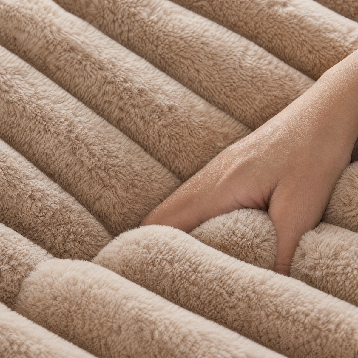 Hand sinking into the thick ribbed faux fur