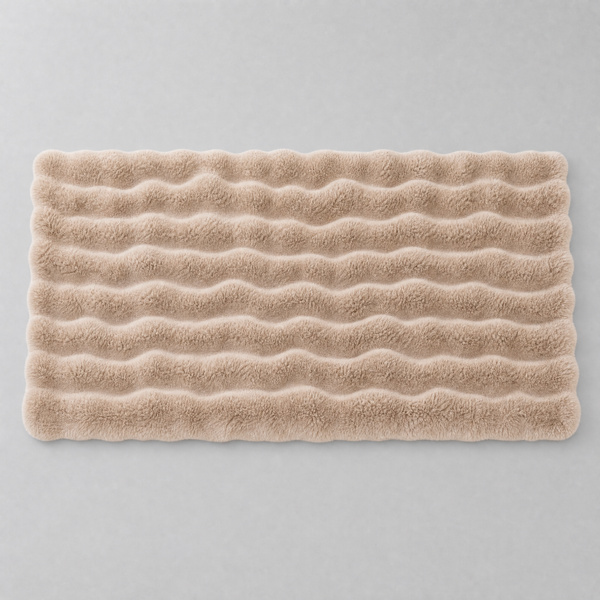 Khaki faux rabbit fur couch cover laid flat, seen from above