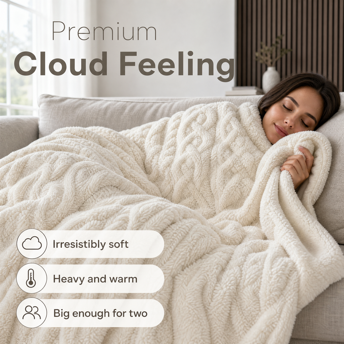 Cream tufted jacquard blanket on a couch with a woman resting under it