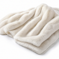 Cream rib faux fur blanket on a white background
