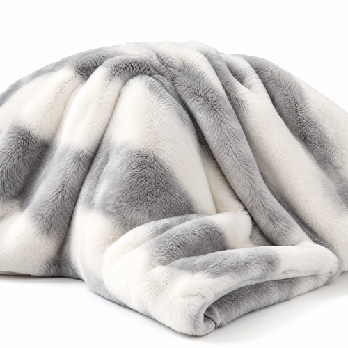 Marbled faux fur blanket on a white background