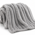 Grey rib plush blanket on a white background