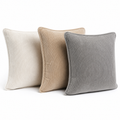 Three velvet corduroy cushion covers on a white background
