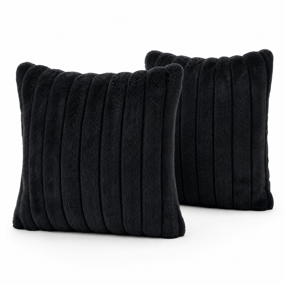 Two black ribbed plush cushion covers on a white background