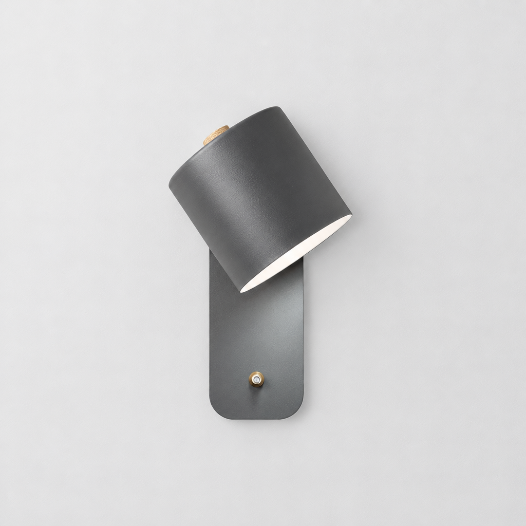 Rhea Rotating Cylinder Wall Lamp, product photo on a light grey background