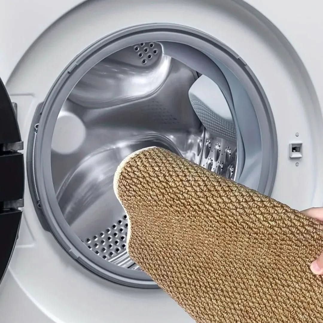 Door mat going into a washing machine