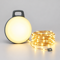 Camping Lantern with String Lights, product photo on a light grey background