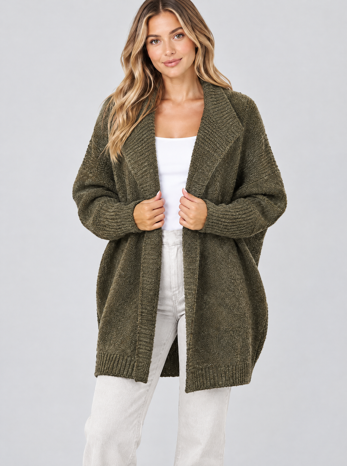 Color block knit cardigan in army green on a model