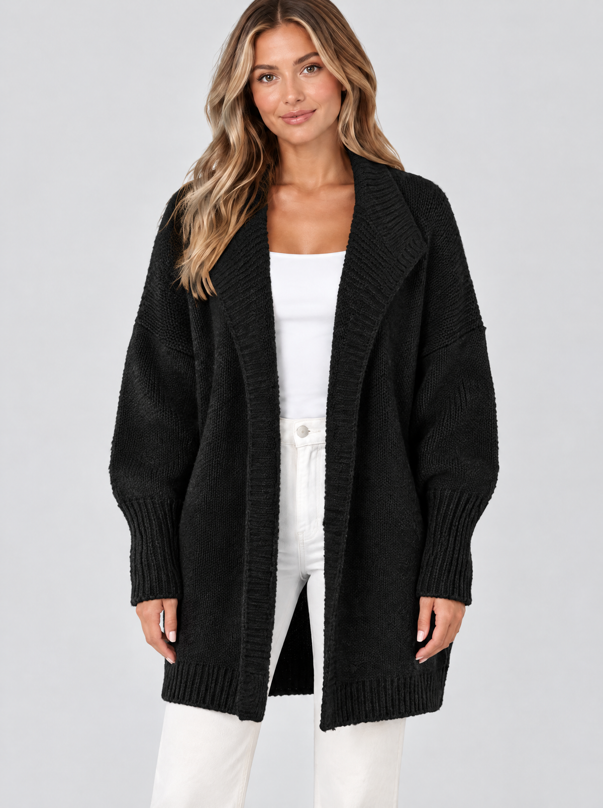 Color block knit cardigan in black on a model