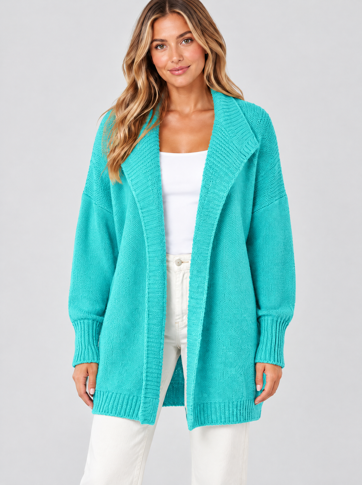Color block knit cardigan in lake blue on a model