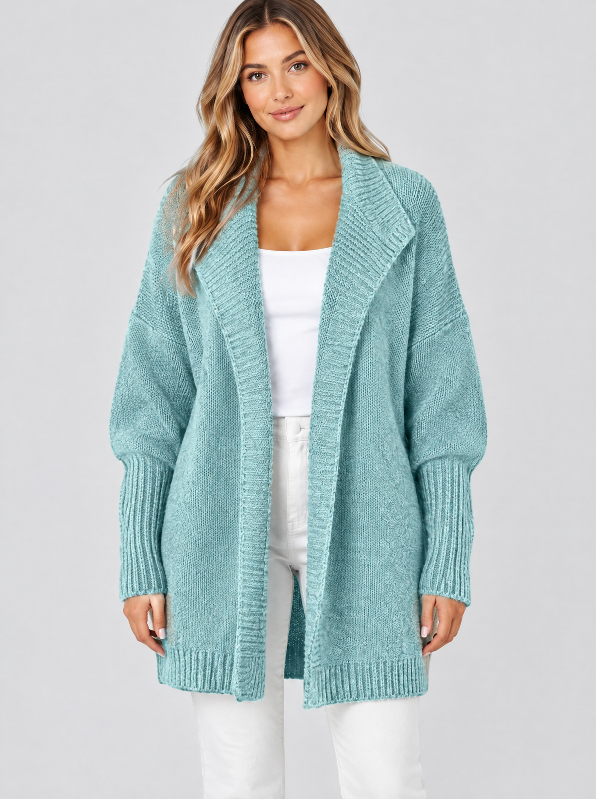 Color block knit cardigan in mint green on a model