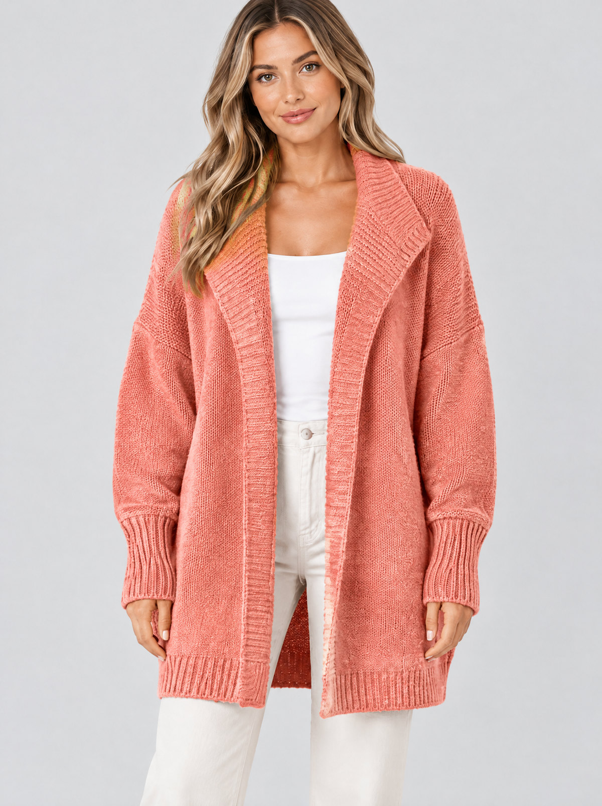 Color block knit cardigan in orange on a model