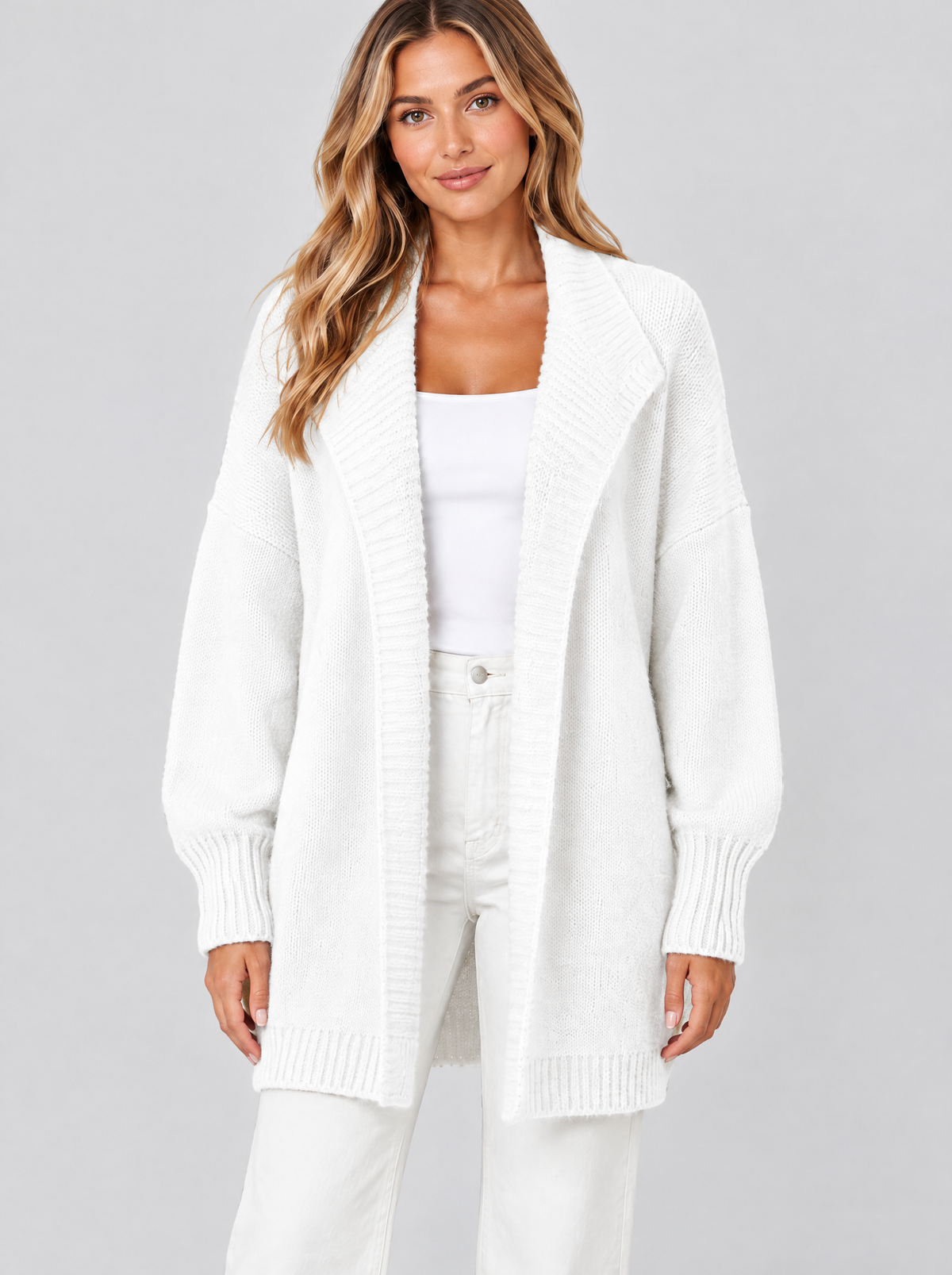 Color block knit cardigan in white on a model