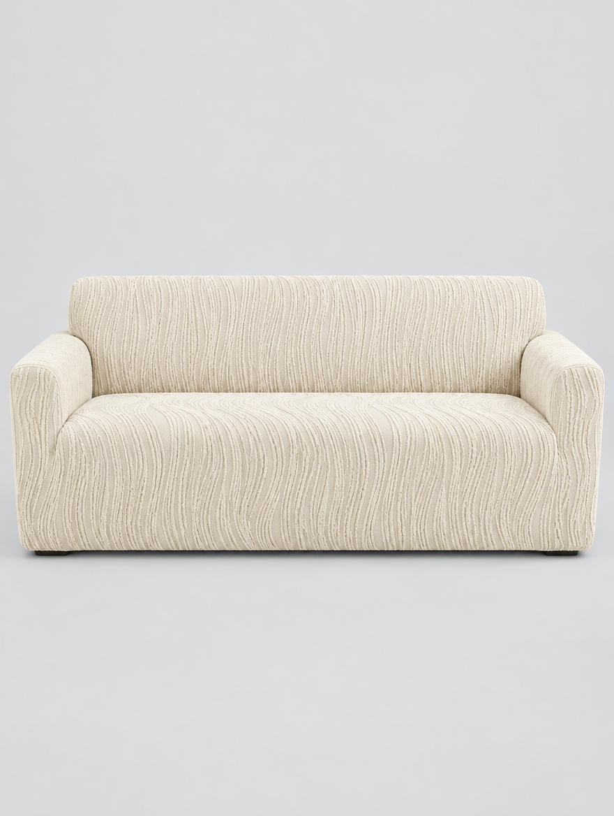 Stretch Sofa Slipcover in beige fitted on a three seat sofa