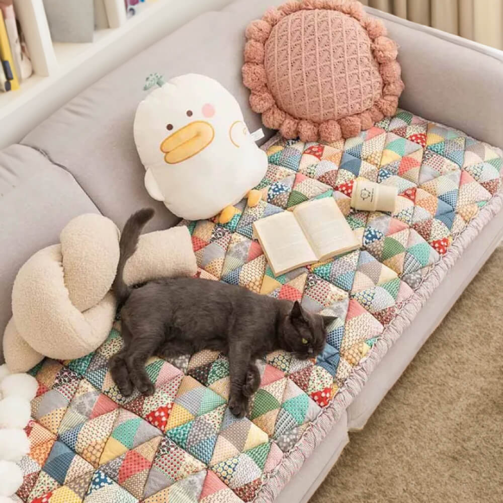 Quilted Patchwork Couch Cover in iris
