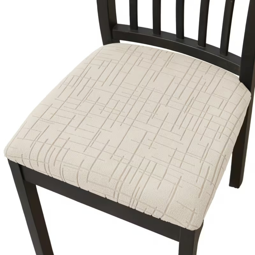 Beige stretch jacquard seat cover on a dining chair