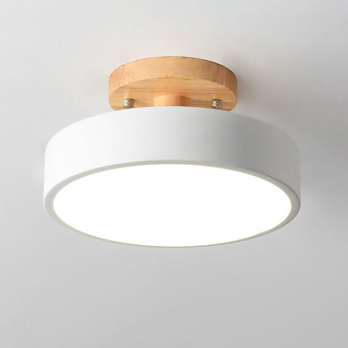 Semi flush ceiling light in a bedroom setting